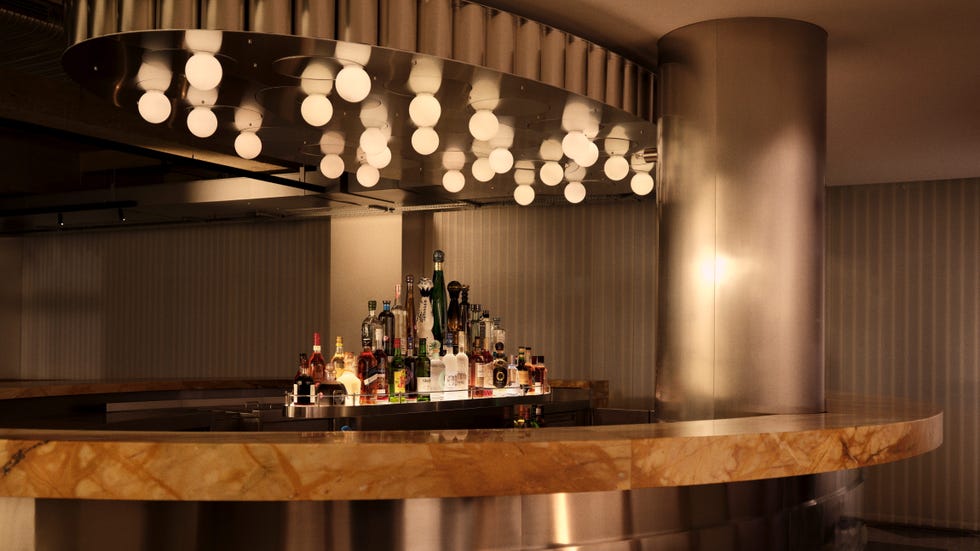 A modern bar with an assortment of liquor bottles