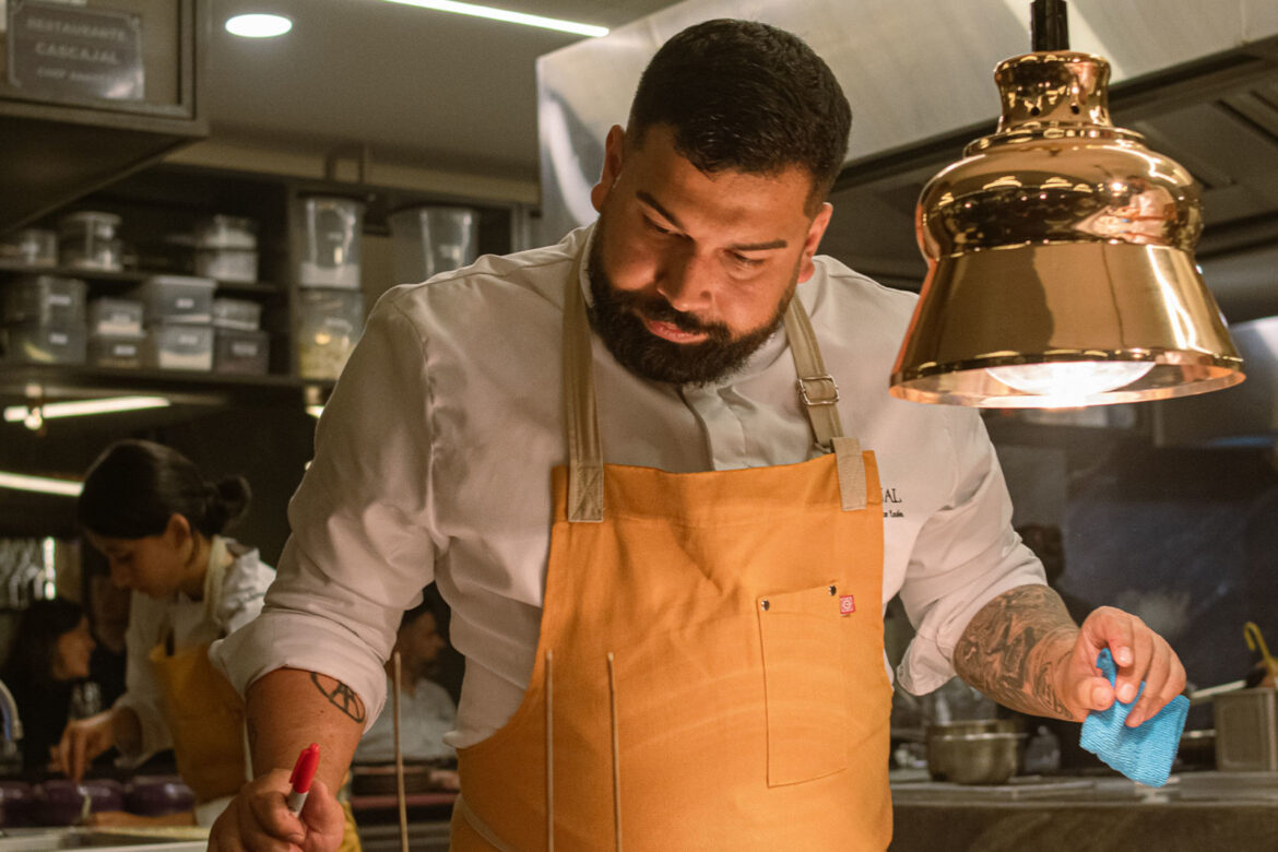 A chef de cuisine working in his kitchen
