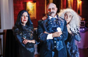 AddamsFest 2024 patrons Lisa Black (as Morticia), Martin Silverman (Uncle Fester) and Pam Keller (Grandmama).