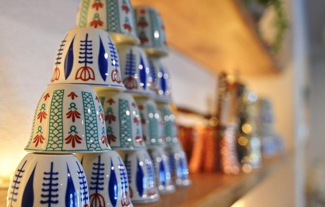 Small coffee cups are stacked at Zaatar Bistro in Fresno.