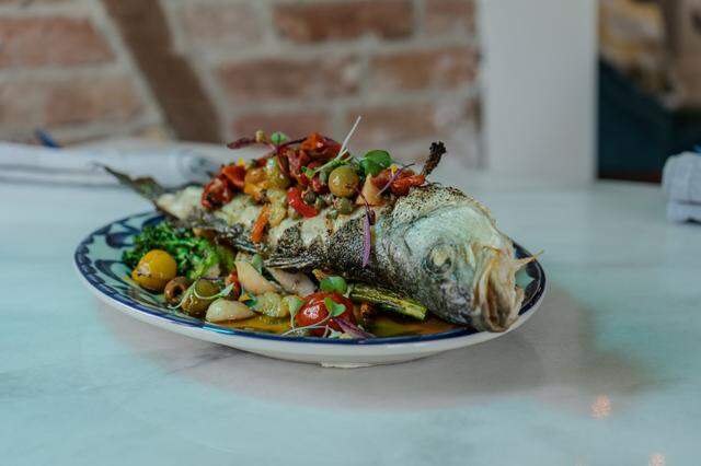 Branzino Acqua Pazza is fresh fish stuffed with fresh ingredients at Field’s Mediterranean restaurant in Biloxi.