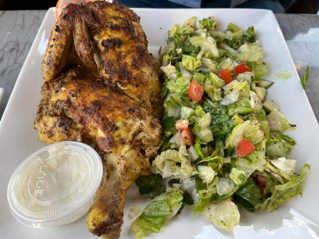 Jasmine Grill in Pineville menu includes a marinated half chicken with side salad, as well as other Mediterranean dishes like kebabs and shawarma.