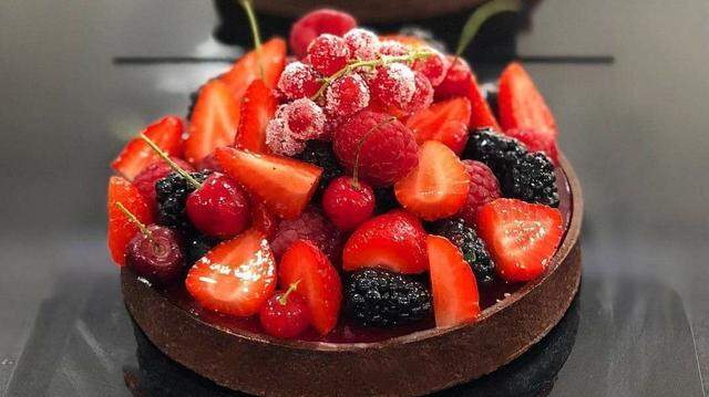 Dolce & Amaro’s fruit tarts are filled with pastry cream and topped with seasonal fresh fruit that’s lightly glazed.