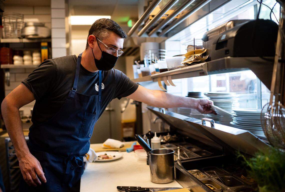 Chef Eric Alexander, co-owner of Restaurant Josephine, works in the kitchen during dinner service Tuesday, Sept. 21, 2021, in Auburn. Alexander and his wife and business partner, Courtney McDonald, were named as semifinalists for a 2026 James Beard Award on Wednesday, Jan. 21, 2026.
