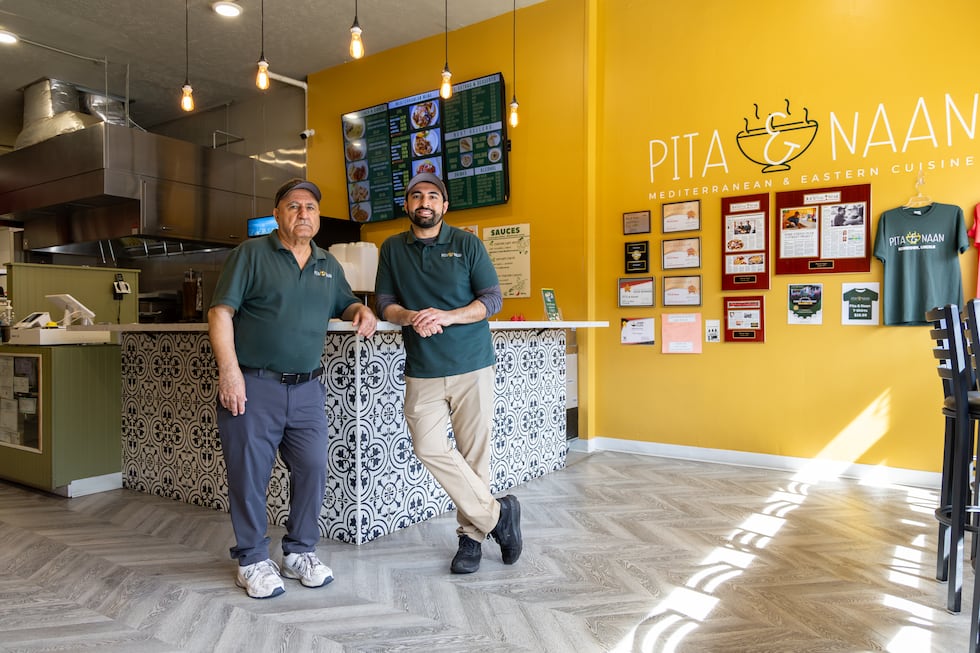 Pita & Naan owner Omar Attaie, right, with his father, Mahboob Attaie. Mahboob Attaie worked...
