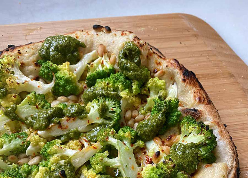 Vegan Romanesco Pizza with Cashew Cream, Salsa Verde and Pine Nuts