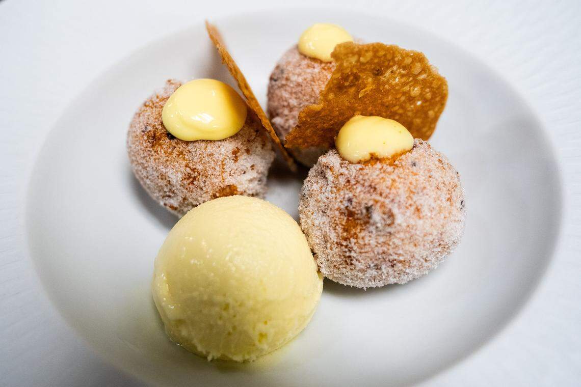 A dessert of bomboloni with lemon curd, brown-butter tuile and toasted fennel lemon gelato is served at Allora in East Sacramento earlier this month. Sous chef Felix Navarro Jr. calls it the powerhouse of desserts and says it has been on the menu since the restaurant’s opening.