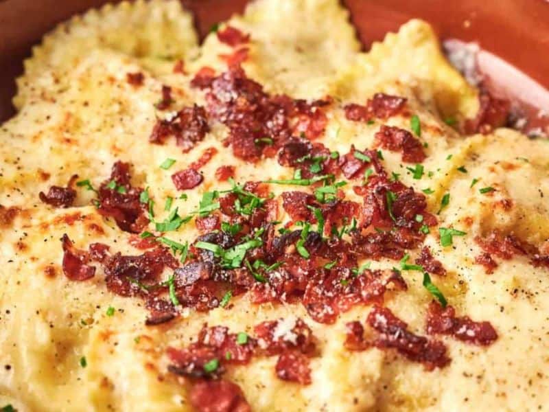 A dish of ravioli with bacon and parsley that can be found at Olive Garden.