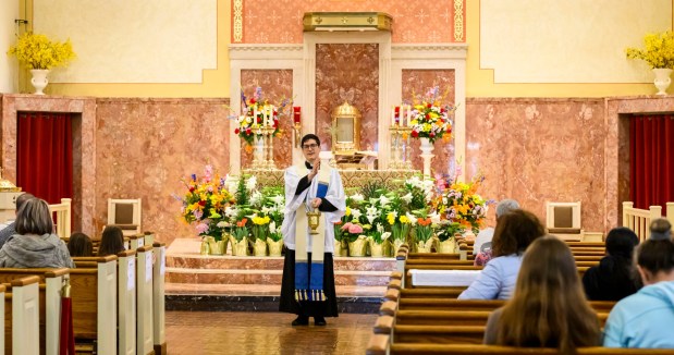 Rev. Giuseppe Esposito speaks Saturday, April 4, 2026, during a blessing of the food baskets on Holy Saturday at St. Anne Catholic Church in Bethlehem. (April Gamiz/The Morning Call)