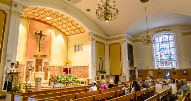 Rev. Giuseppe Esposito speaks Saturday, April 4, 2026, during a blessing of the food baskets on Holy Saturday at St. Anne Catholic Church in Bethlehem. (April Gamiz/The Morning Call)