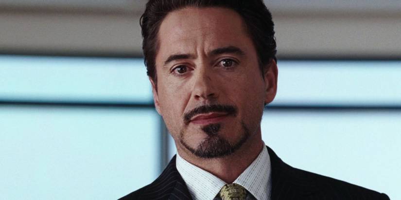 Robert Downey Jr. as Tony Stark giving a press conference in 'Iron Man.'