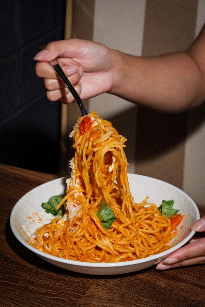 Spaghetti al Pomodoro with garden basil and burrata at Verise Carlsbad