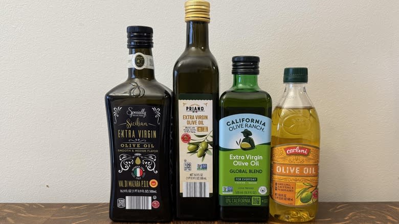An image of the four ranked Aldi olive oils.