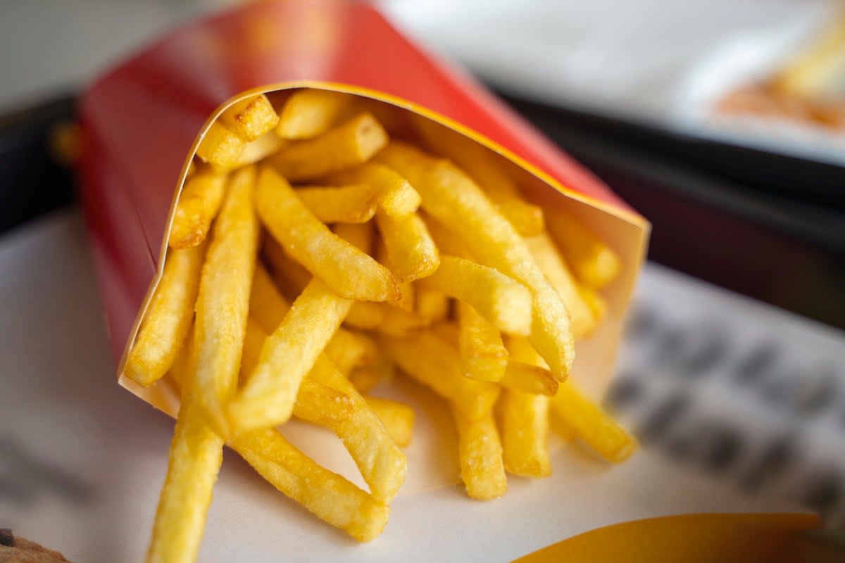 Researchers at the University of Illinois have reportedly found a way to make french fries that absorb less oil — and thus less fat — without losing their taste or crispiness by using a combination of traditional frying and a microwave (Getty Images)