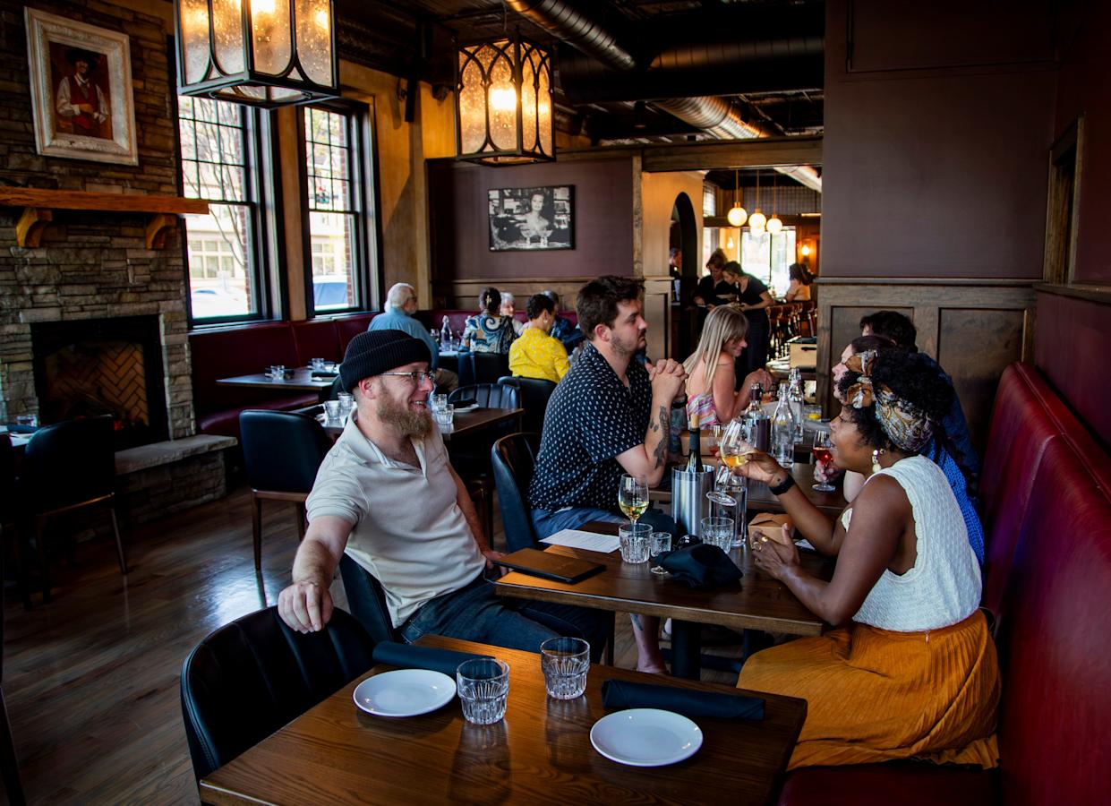 Guests dine inside Gemelli during a preview event at the restaurant in Asheville’s Biltmore Village on April 13, 2026, ahead of its grand opening.