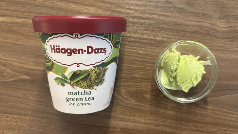 Häagen-Dazs Matcha Green Tea Ice Cream carton next to ice cream in glass ramekin