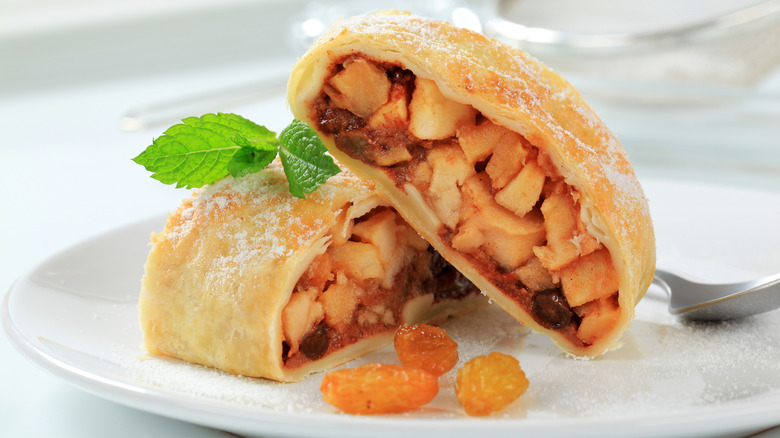 Apple strudel on white plate 