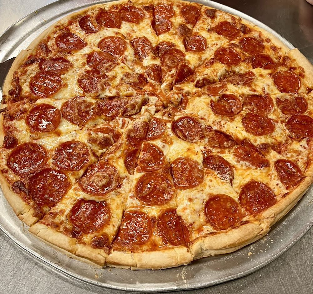 Popplo's Pizza and Que Burgers