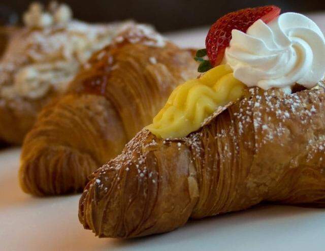 Dolce & Amaro sells both plain and filled varieties of Italian brioche pastries.