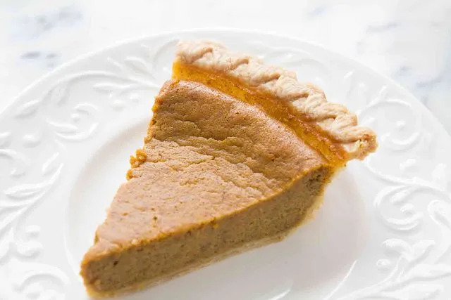 Elise Bauer Wholly Wholesome traditional pie crust baked into a pumpkin pie
