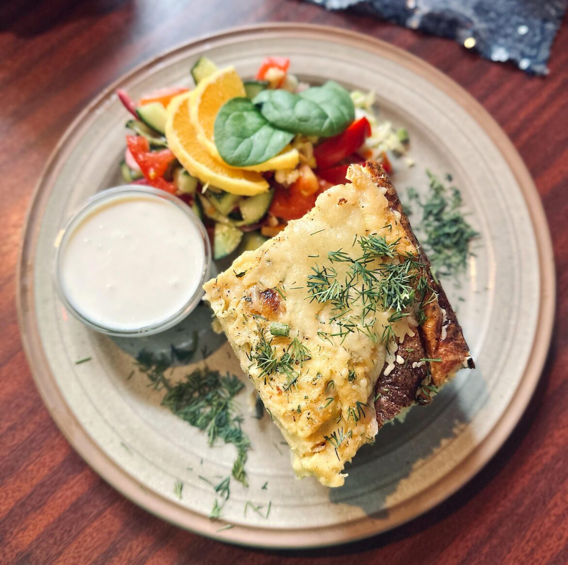 Oven omelette with sour cream and salad
