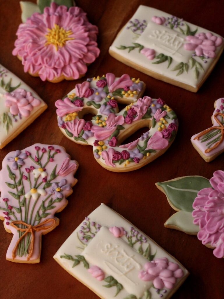 A small batch of some pretty floral birthday cookies