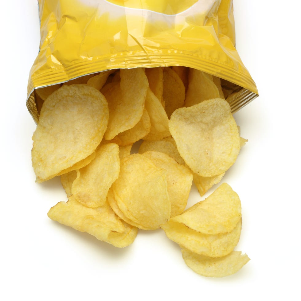 bag of golden chips isolated on a white background