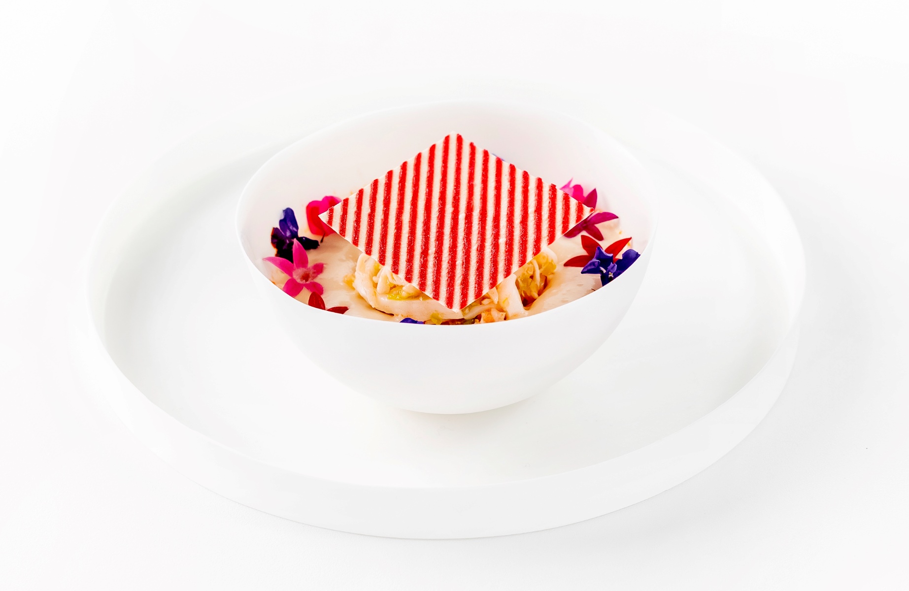 King Crab, Fresh Coconut and Pink Peppercorns: A dish at Evvai that evoked Brazil’s coastline with the essence of crab and the subtlety of coconut. © Tadeu Bruneli/Evvai