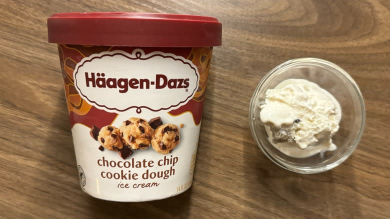 Häagen-Dazs Chocolate Chip Cookie Dough Ice Cream carton next to ice cream in glass ramekin