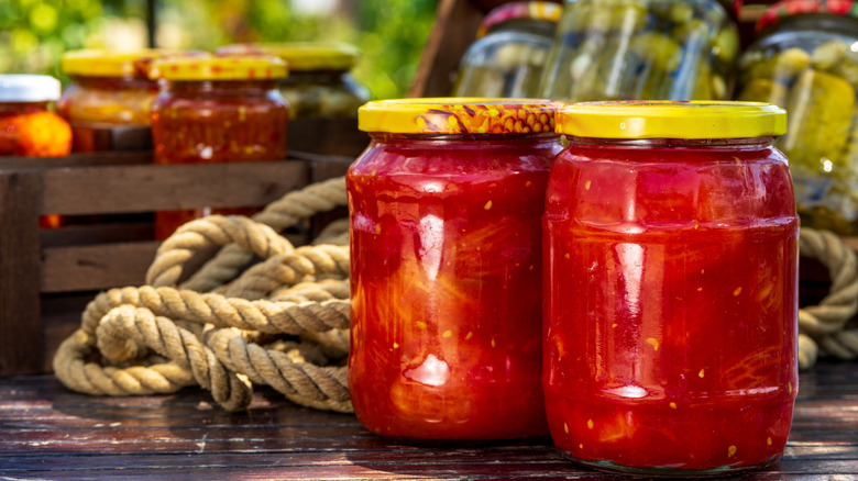Jars of canned tomatoes