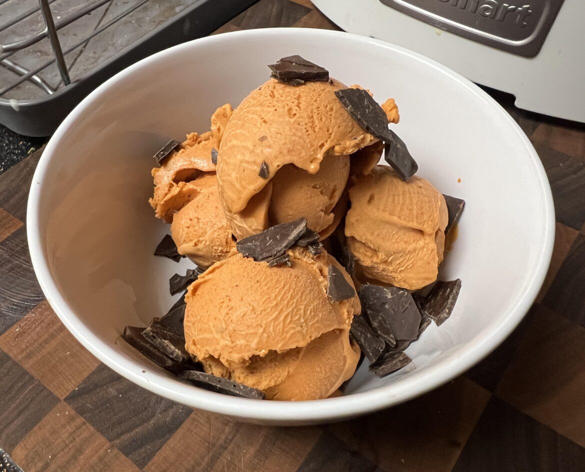 Peach + red chile ice cream with toasted sesame chocolate topping