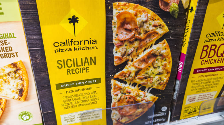 A California Pizza Kitchen pizza is displayed in a grocery store cold case