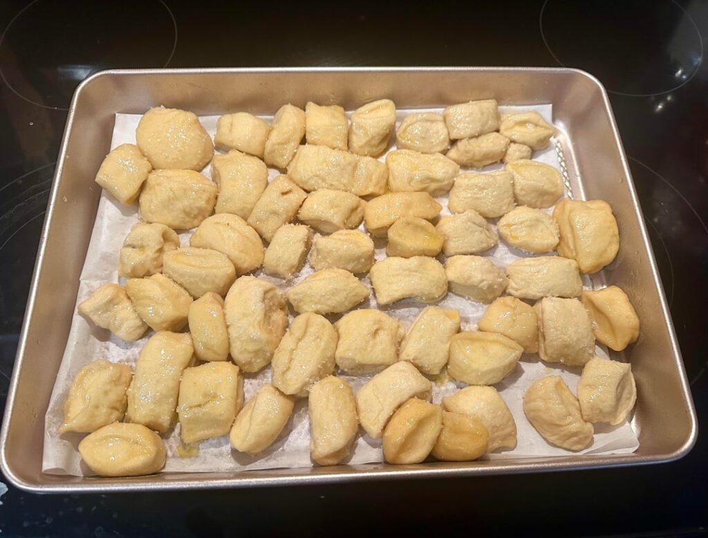 Let’s make sourdough discard pretzel bites instead of crying.