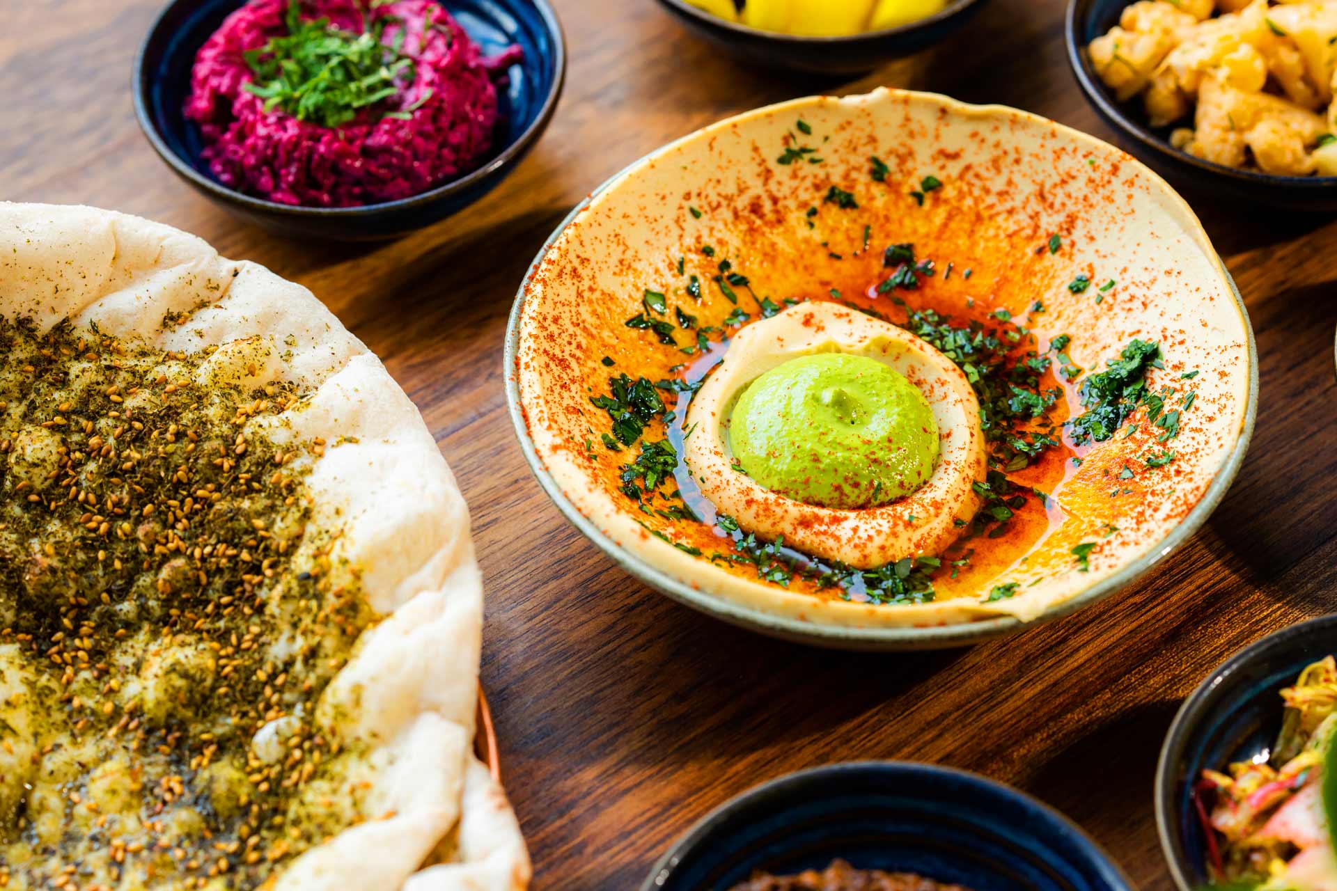 Zahav's  signature creamy hummus topped with tahini and fresh bread. © Daniel Knoll/Zahav
