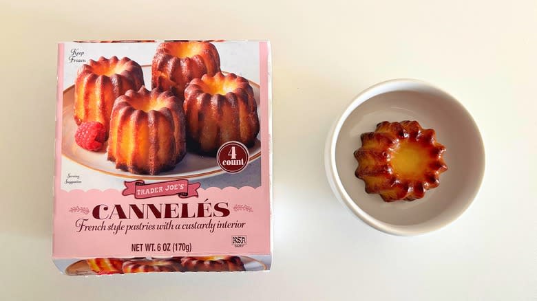 Trader Joe's Cannelés in a small white dish next to a box on a white table