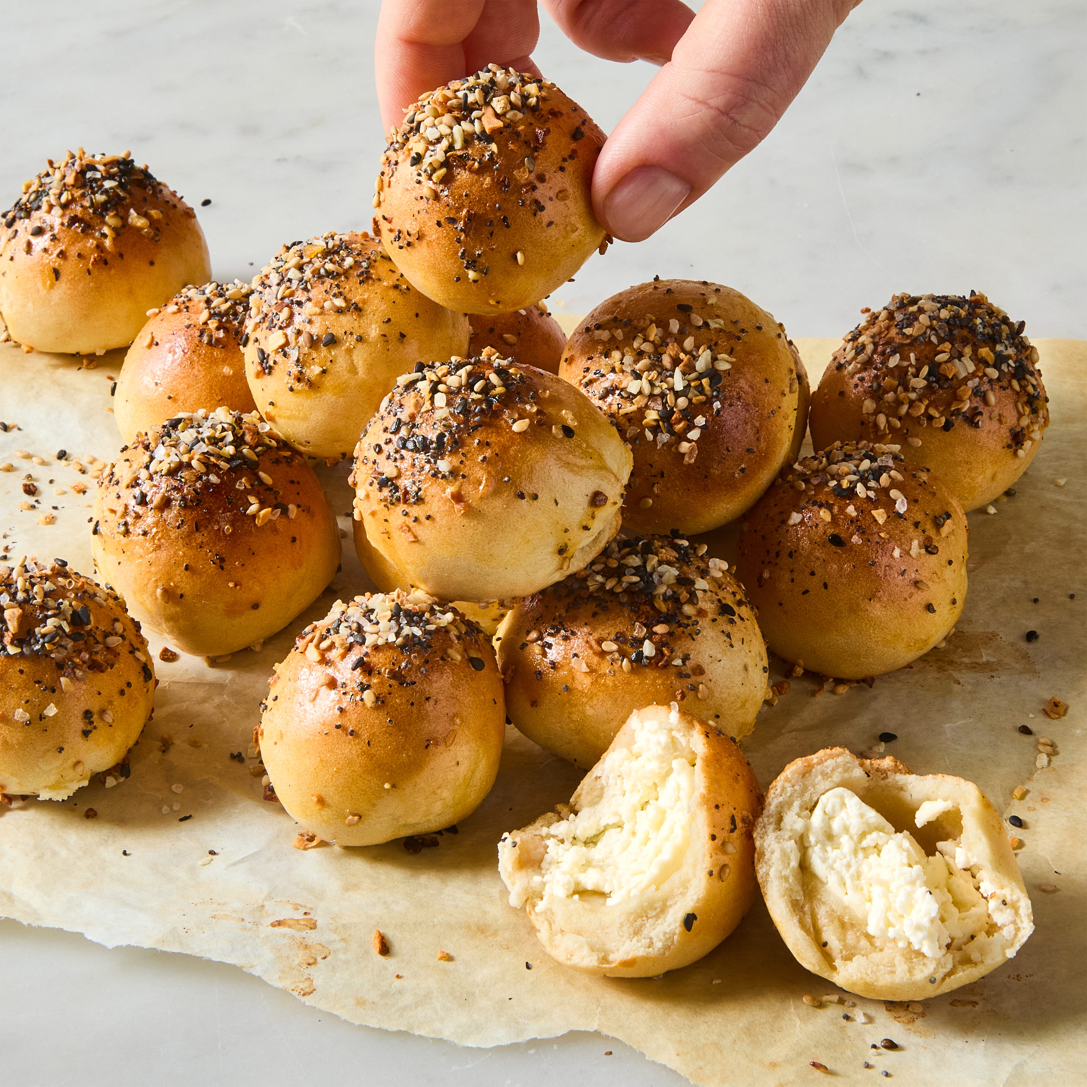 mini bagel bites stuffed with cream cheese and topped with everything seasoning