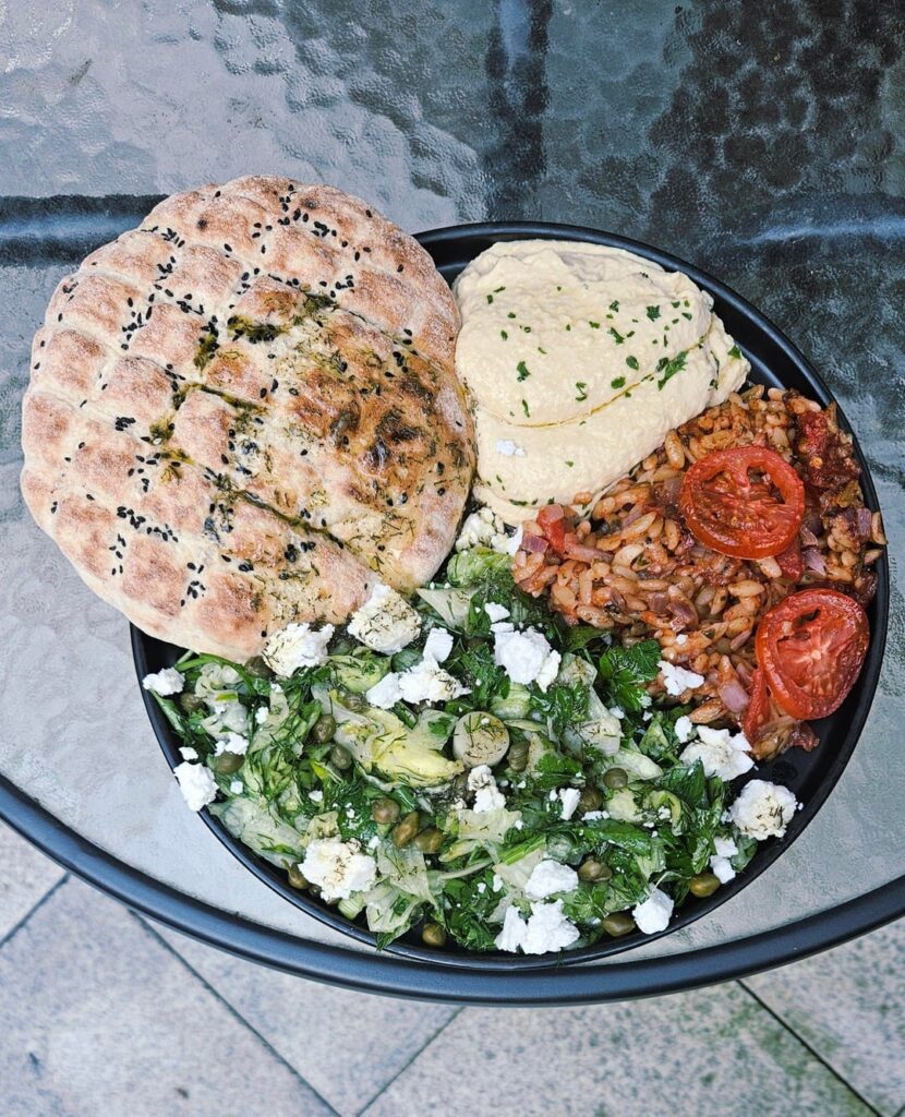 Lunch Today. Homemade Hummus, Maroulosalata, Flatbread, and Tomato Baked Orzo.