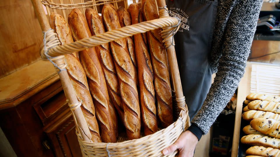 A decline in bread consumption and new takes on bread baking are among the forces challenging the baguette's place on French tables. - Chesnot/Getty Images