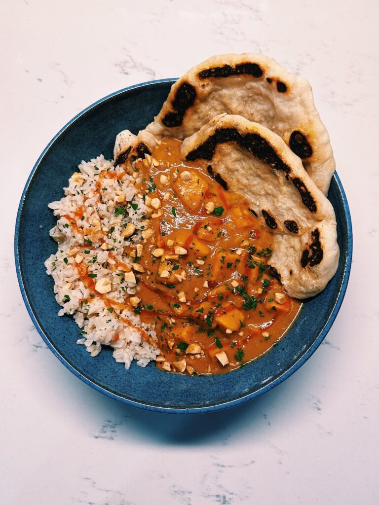 maafe - also known as african peanut strew! served with brown rice + homemade naan