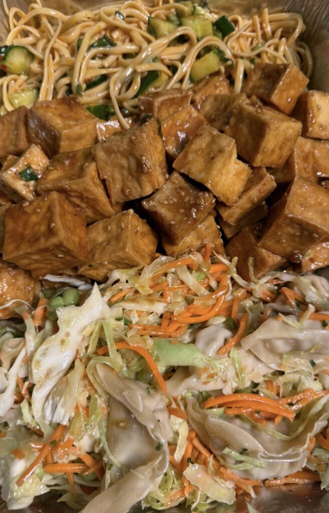Tasty sesame noodles, tofu, and potsticker salad.