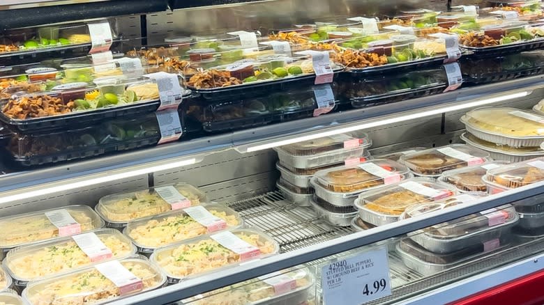 Prepared meals including stuffed peppers and taco kit on display in Costco store
