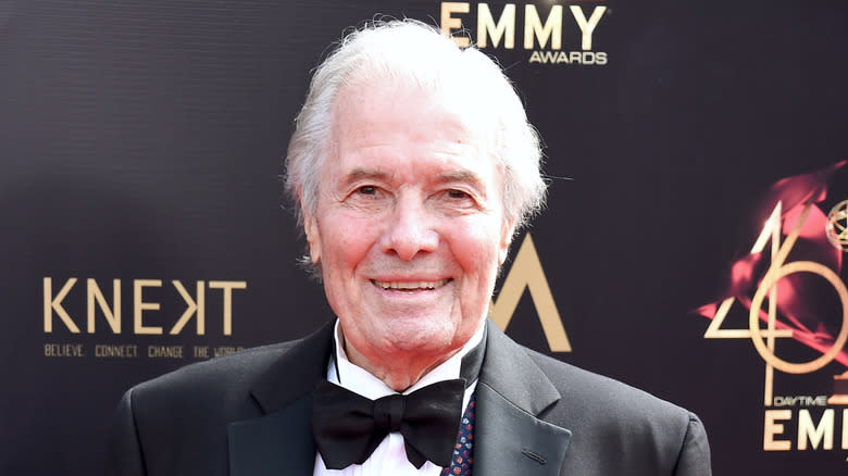 Jacques Pépin, smiling on a red carped