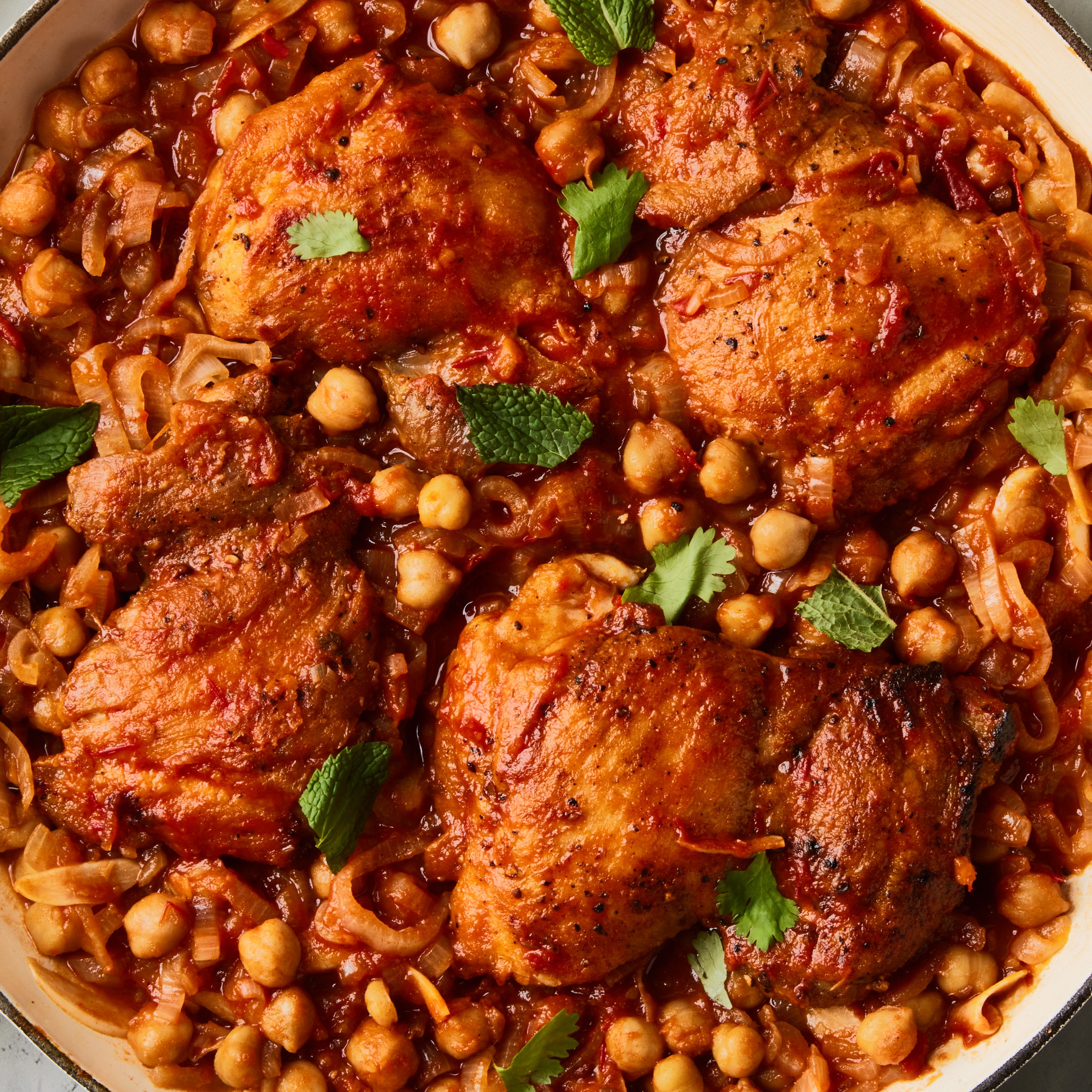 harissa chickpea and chicken skillet topped with mint