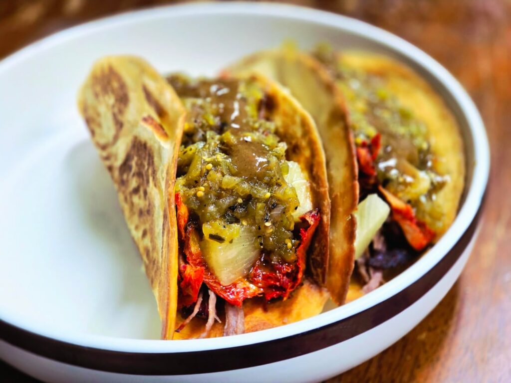 Pulled pork, smoked kimchi, pineapple, and tomatillo salsa