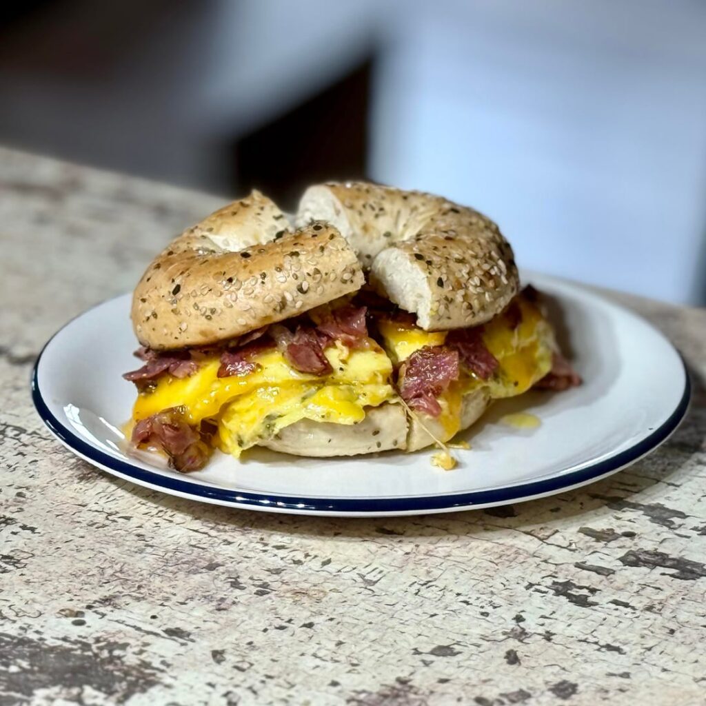 Leftover Wagyu Pastrami on a Everything bagel with Colby cheese and egg.