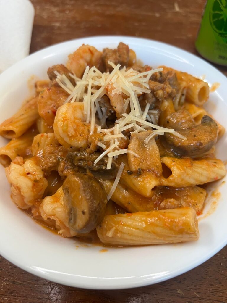 Rigatoni with red sauce and mushrooms ,shrimp and Italian sausage
