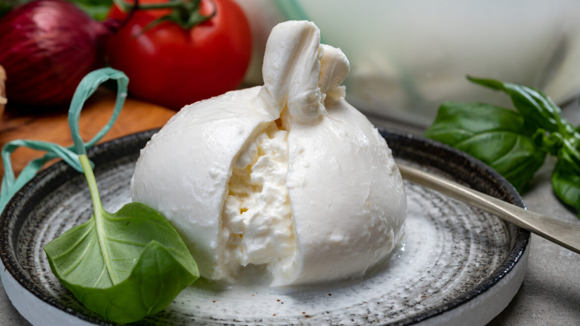 The Iconic Italian Dish That Deserves A Burrata Swap For The Cheesiest Bite