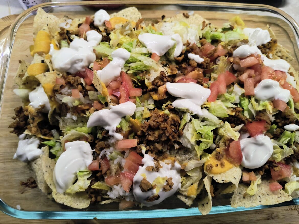 Loaded TVP nachos. Homemade cheese, forager sour cream