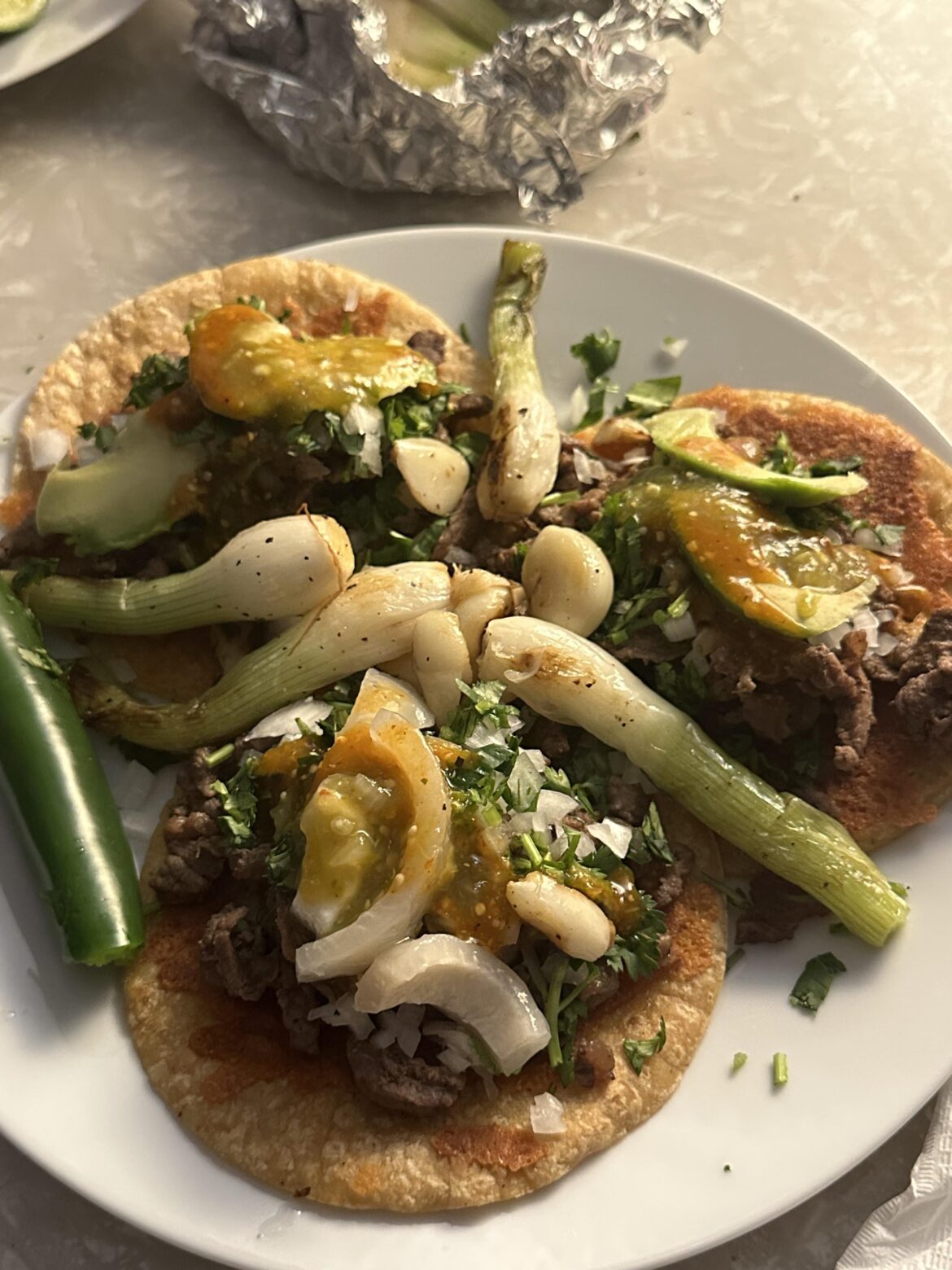 Cheese crusted asada tacos