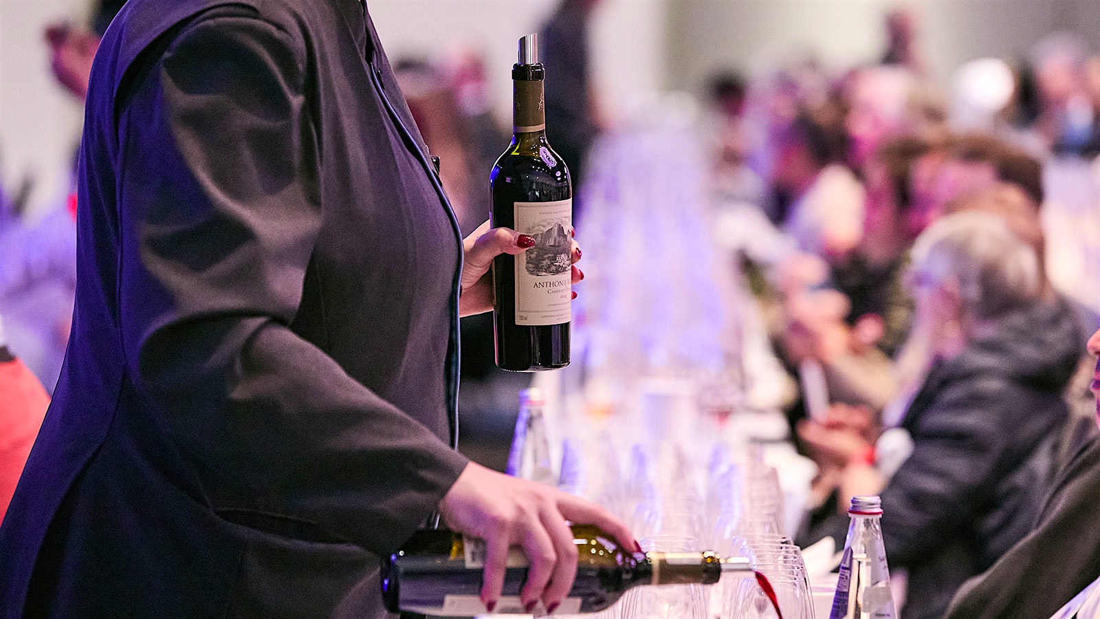 A bottle of Anthonij Rupert Wyne Cabernet Franc Franschhoek 2019 being poured at Wine Spectator's New York Wine Experience